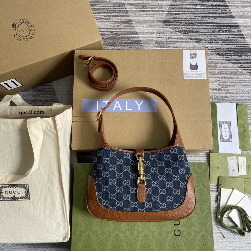 G*u*i top handle bags